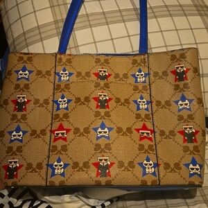 Pocket books Tommy hillier and Michael kors worn only once price will negotiate